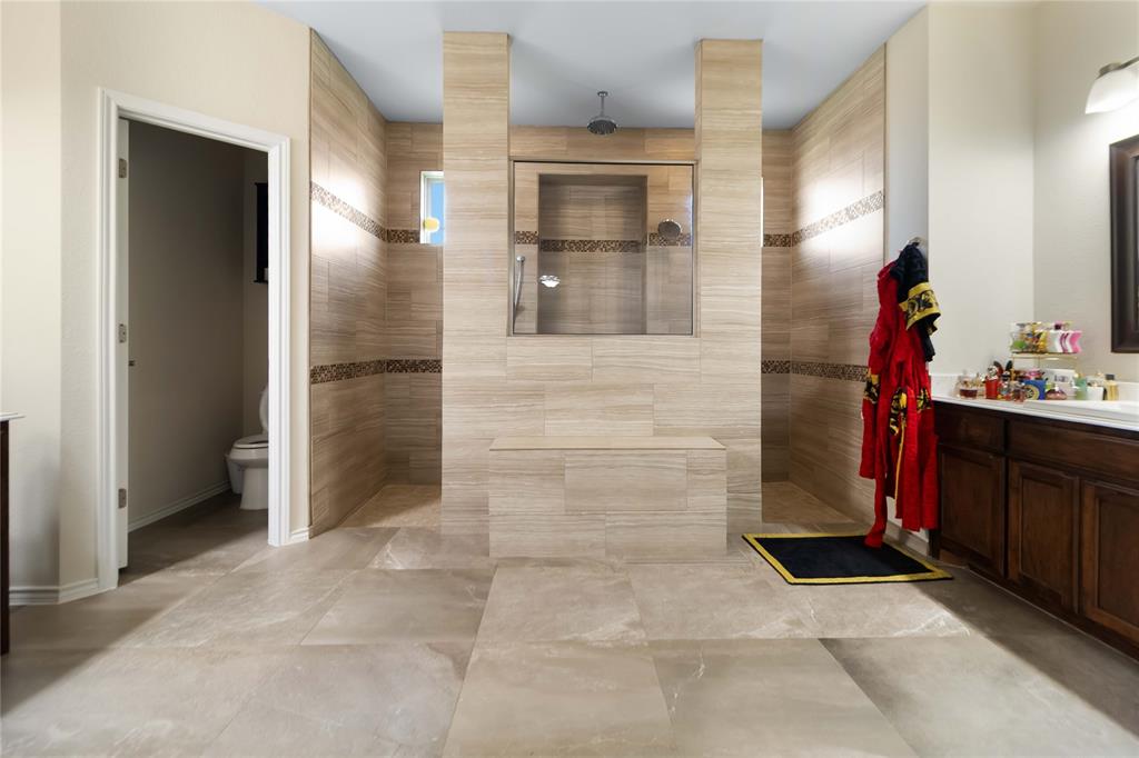 1663 Fraser Drive Burleson, TX 76028 - Photo 10 of 22 Bathroom featuring vanity and walk in shower