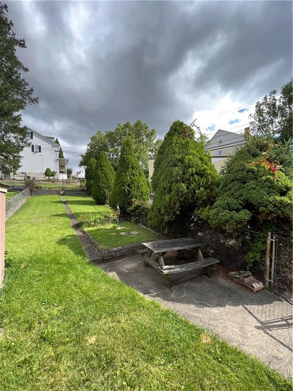 2339 Spring Street Pittsburgh, PA 15210 - Photo 2 of 21 a car parked in the middle of a field