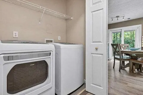 a utility room with dryer and washer