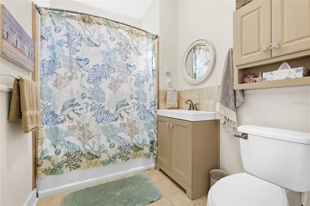 a bathroom with a toilet and a sink