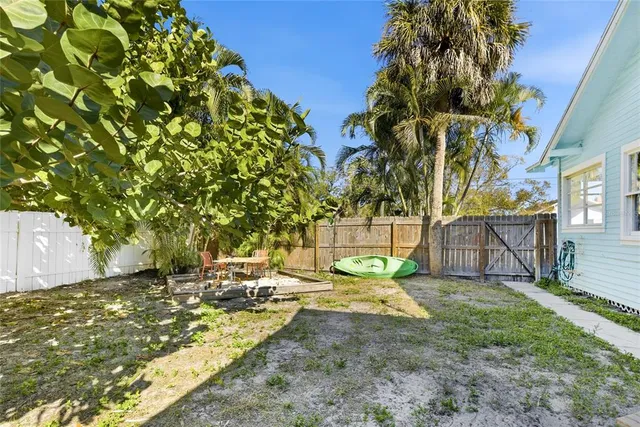 a view of backyard with tree