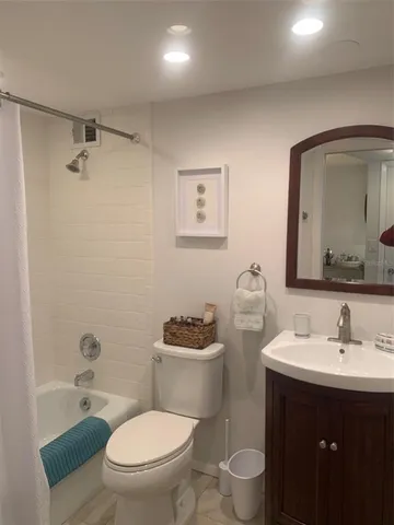 a view of a chairs and table in the balcony