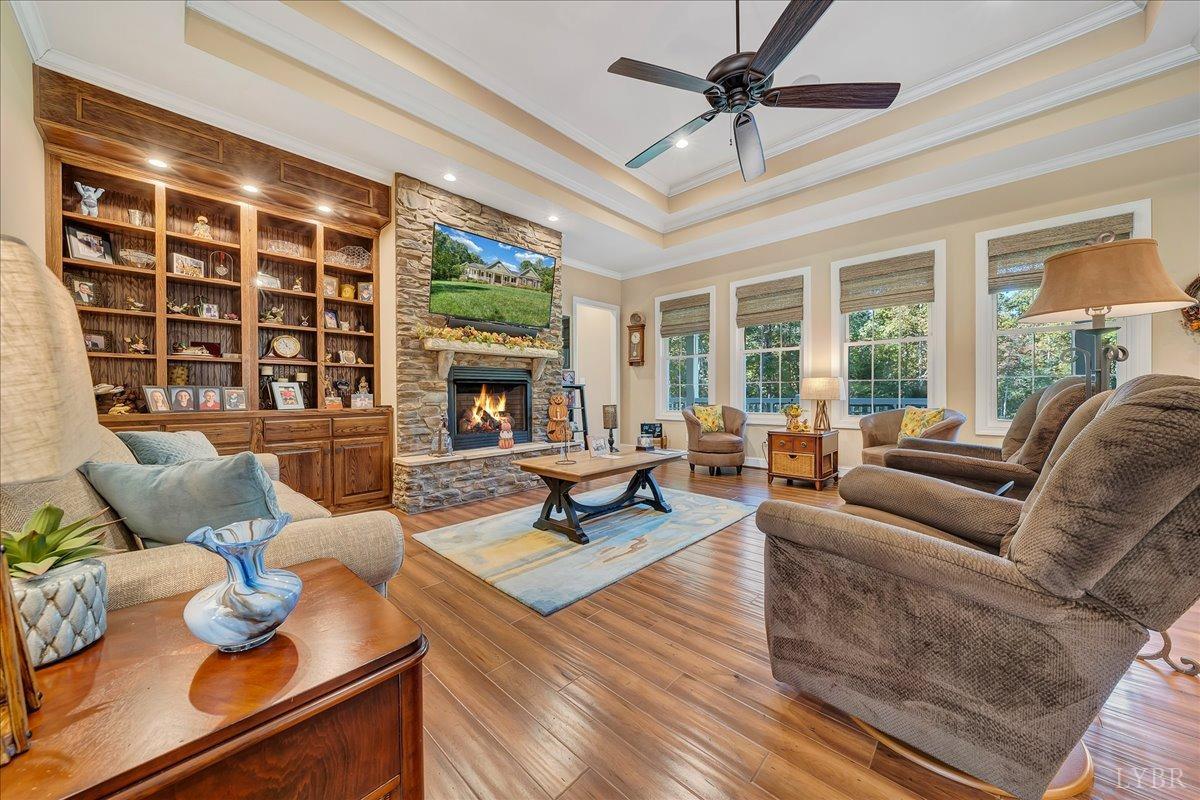 699 Police Tower Road Appomattox, VA 24522 - Photo 12 of 66 a living room with furniture and a floor to ceiling window