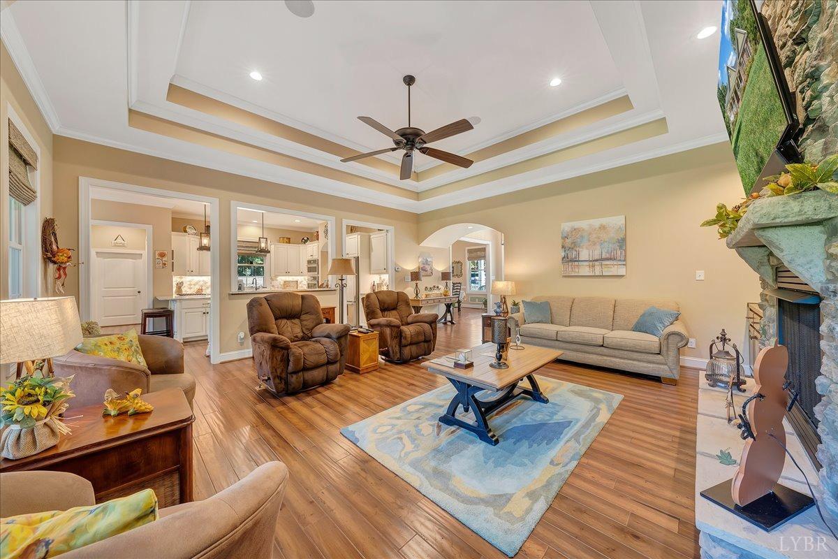 699 Police Tower Road Appomattox, VA 24522 - Photo 14 of 66 a living room with furniture and a wooden floor