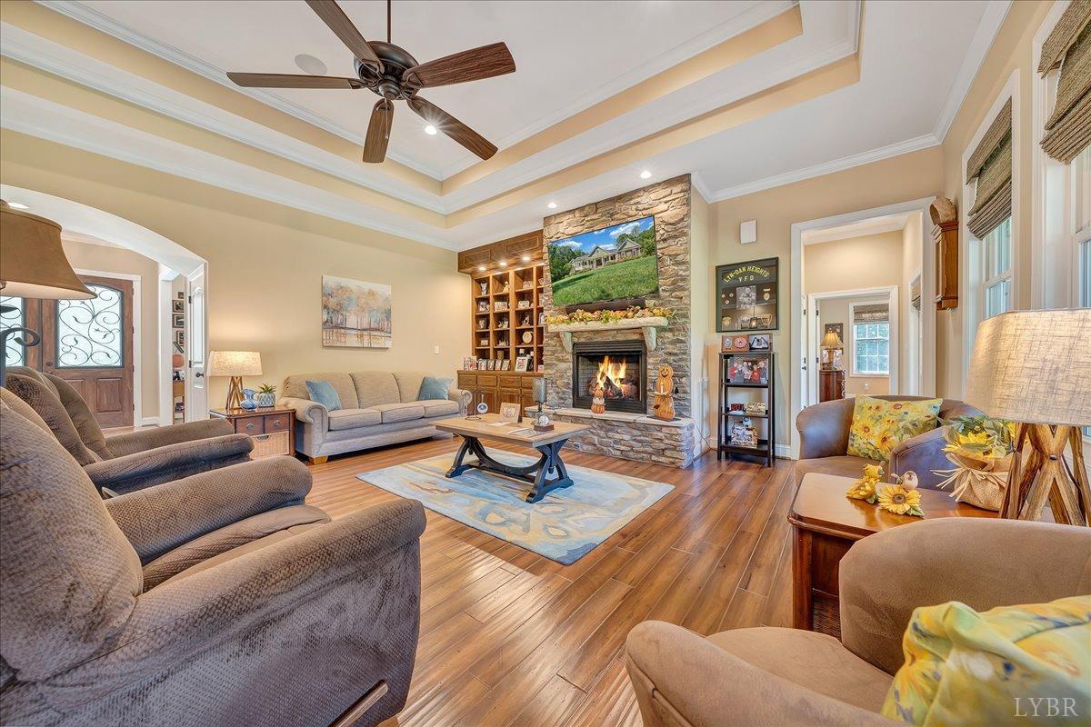 699 Police Tower Road Appomattox, VA 24522 - Photo 16 of 66 a living room with furniture or couches and a fireplace