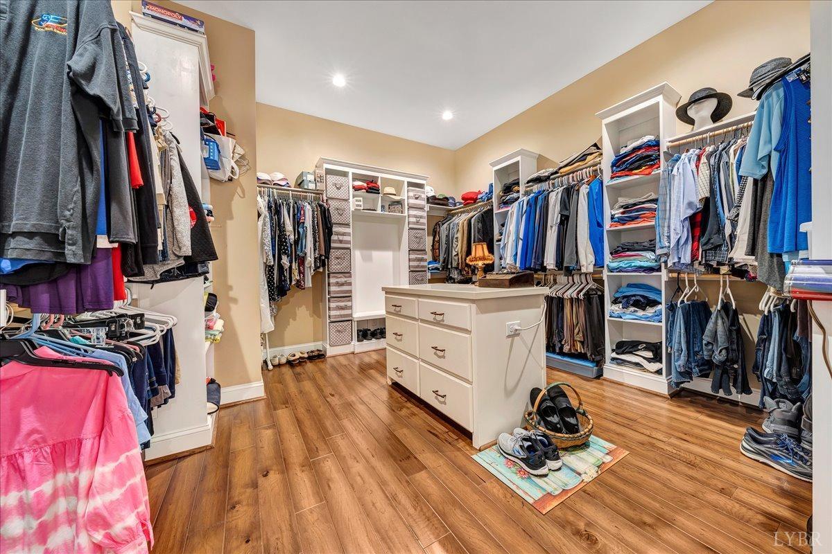 699 Police Tower Road Appomattox, VA 24522 - Photo 37 of 66 a view of walk in closet with clothes and shoes