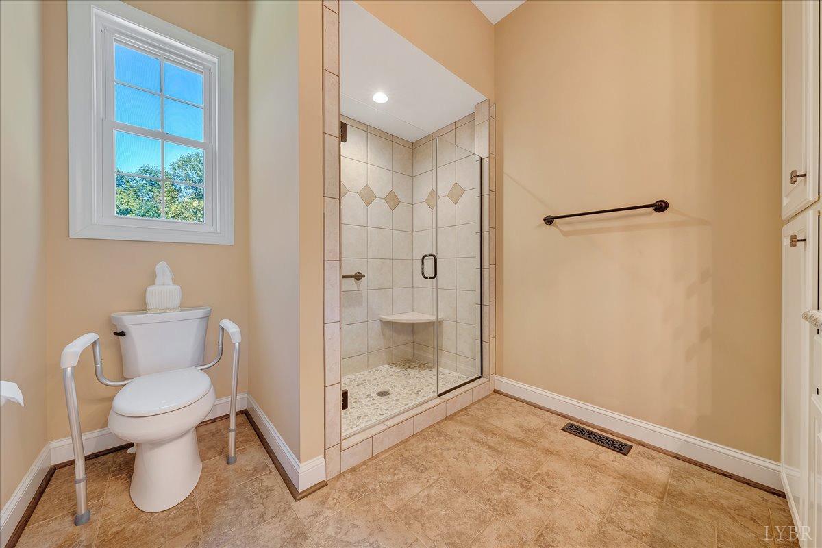 699 Police Tower Road Appomattox, VA 24522 - Photo 41 of 66 a bathroom with a toilet and a shower