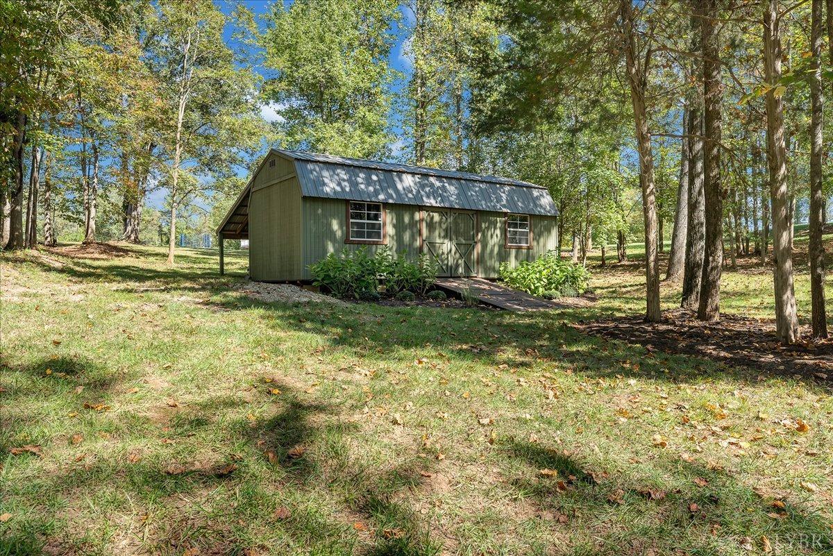699 Police Tower Road Appomattox, VA 24522 - Photo 57 of 66 a view of a house with a yard