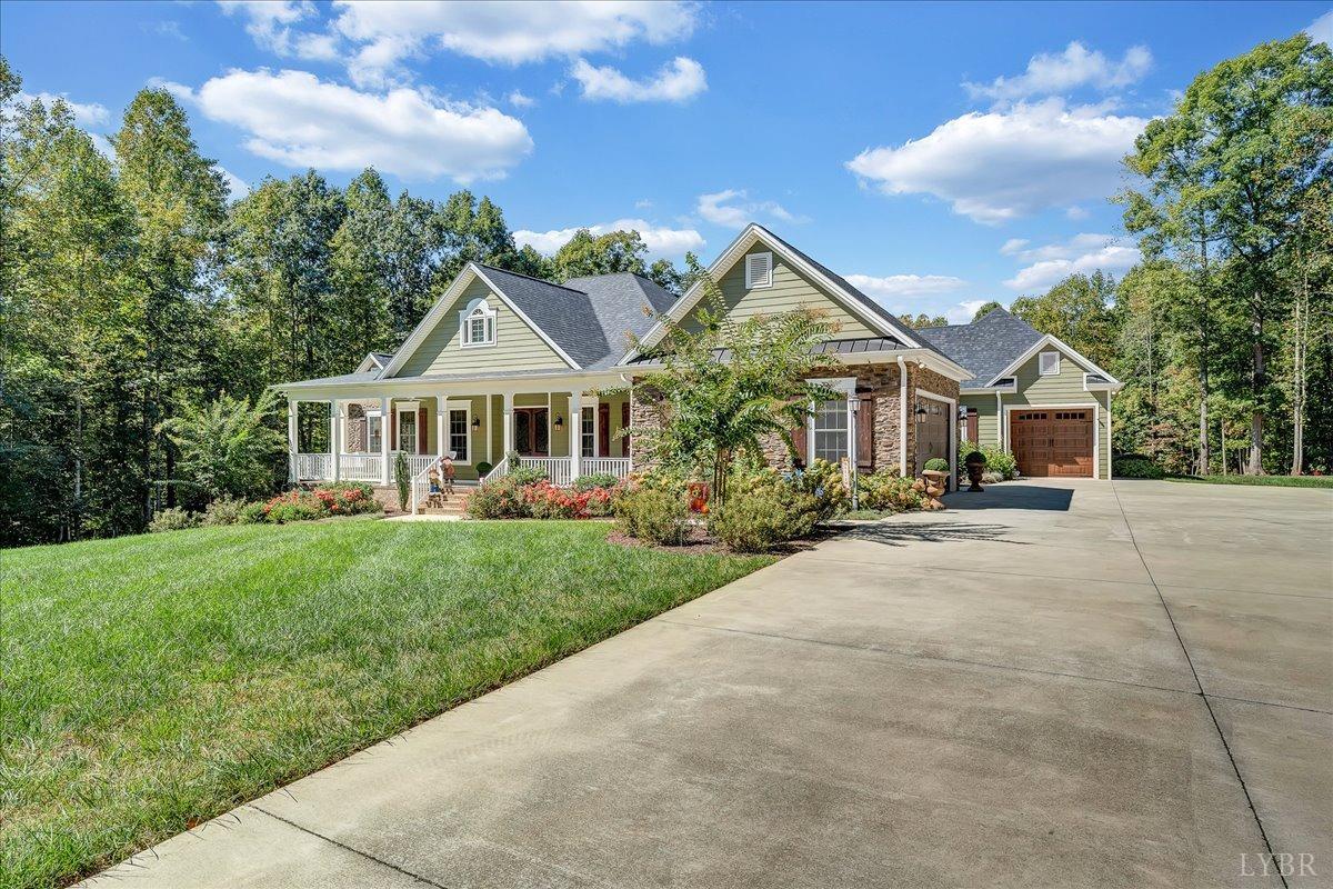 699 Police Tower Road Appomattox, VA 24522 - Photo 64 of 66 a front view of a house with a yard