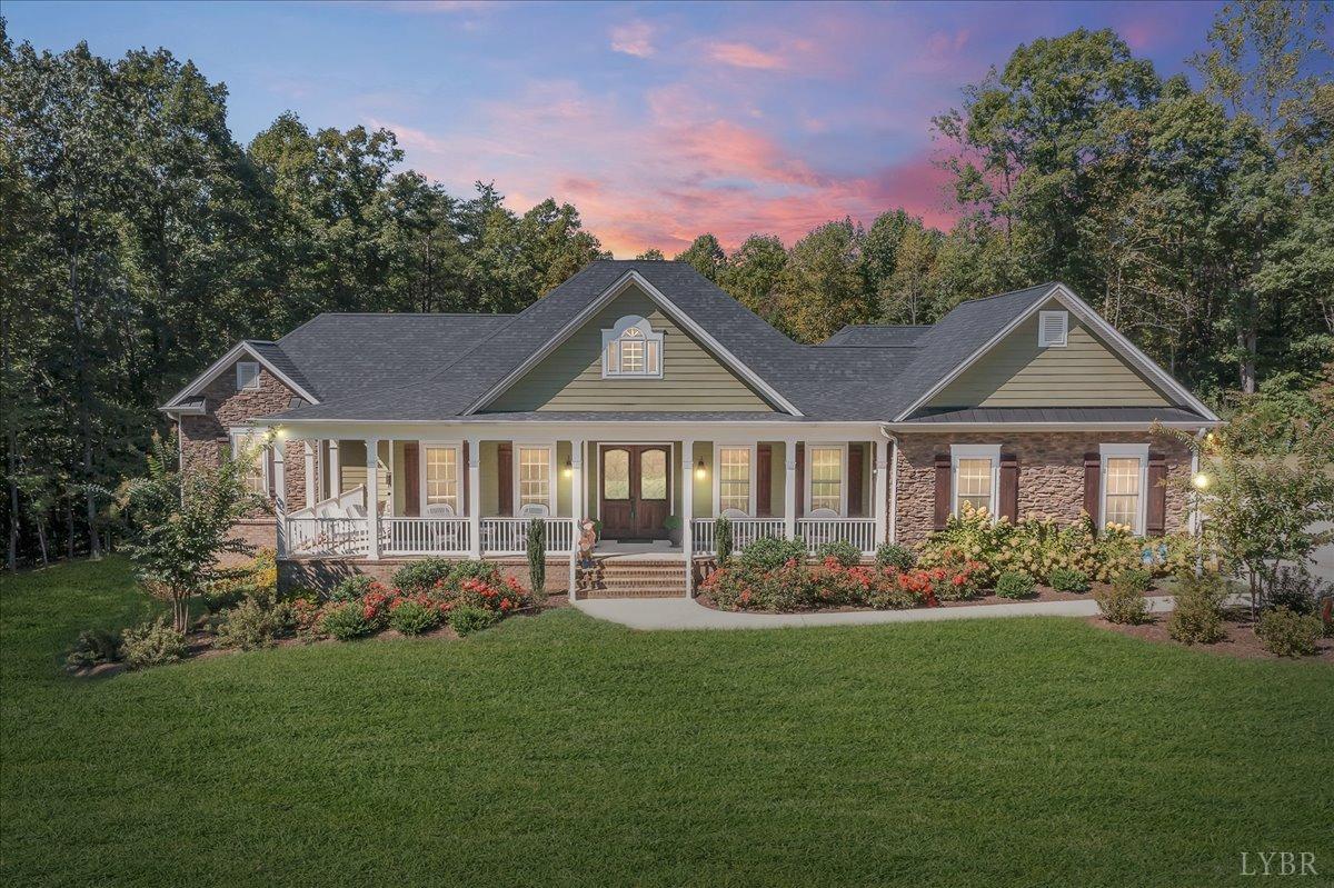 699 Police Tower Road Appomattox, VA 24522 - Photo 66 of 66 a front view of a house with a garden