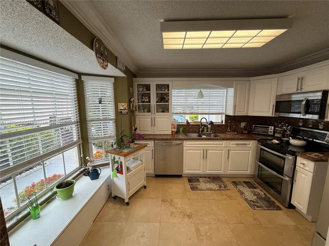 $670,000 | 1040 Southwest 153rd Terrace, Pembroke Pines, FL 33027