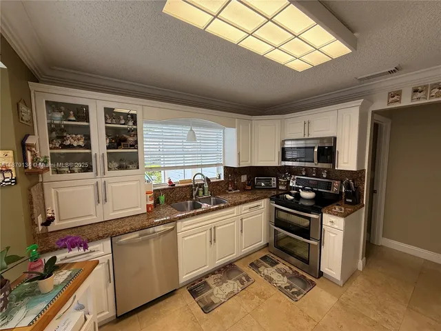 $670,000 | 1040 Southwest 153rd Terrace, Pembroke Pines, FL 33027