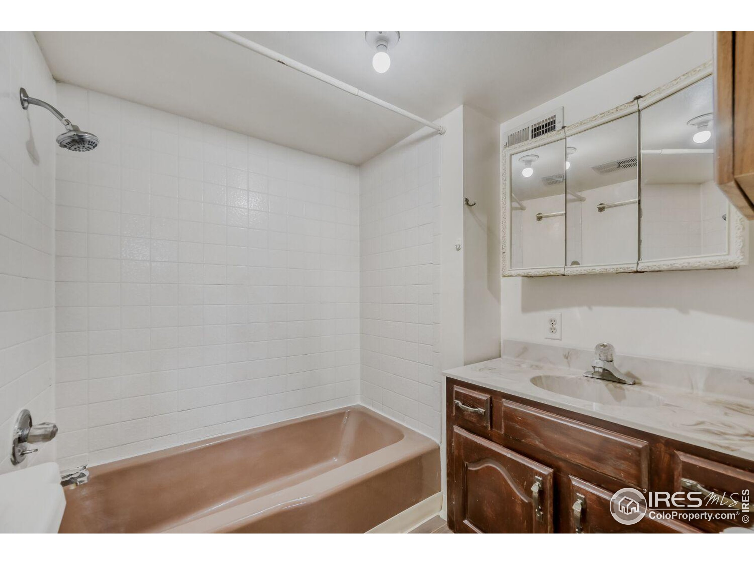534 Dewey Avenue Boulder, CO 80304 - Photo 11 of 17 a bathroom with a sink and a bathtub