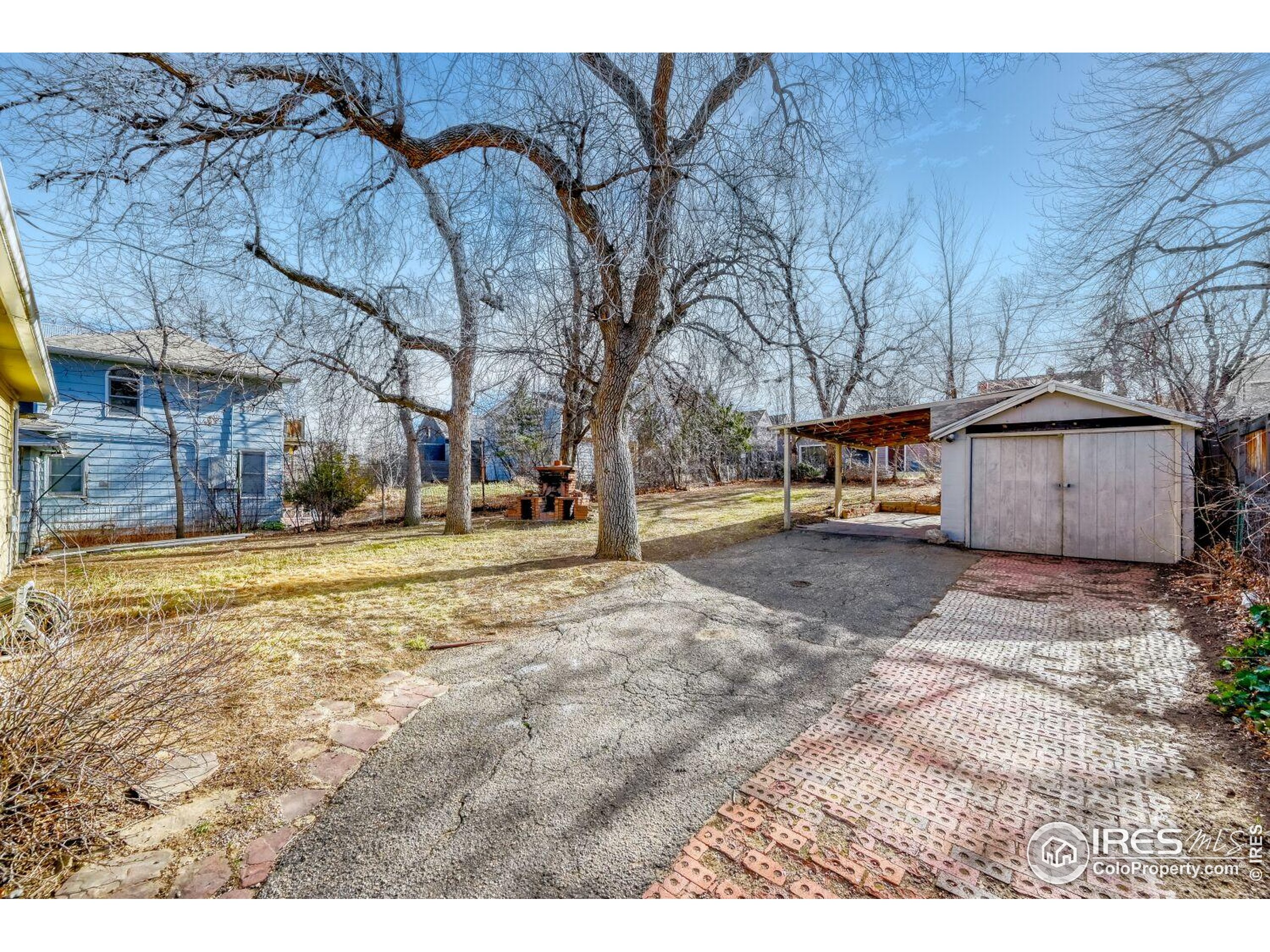 534 Dewey Avenue Boulder, CO 80304 - Photo 17 of 17 a view of road with large trees