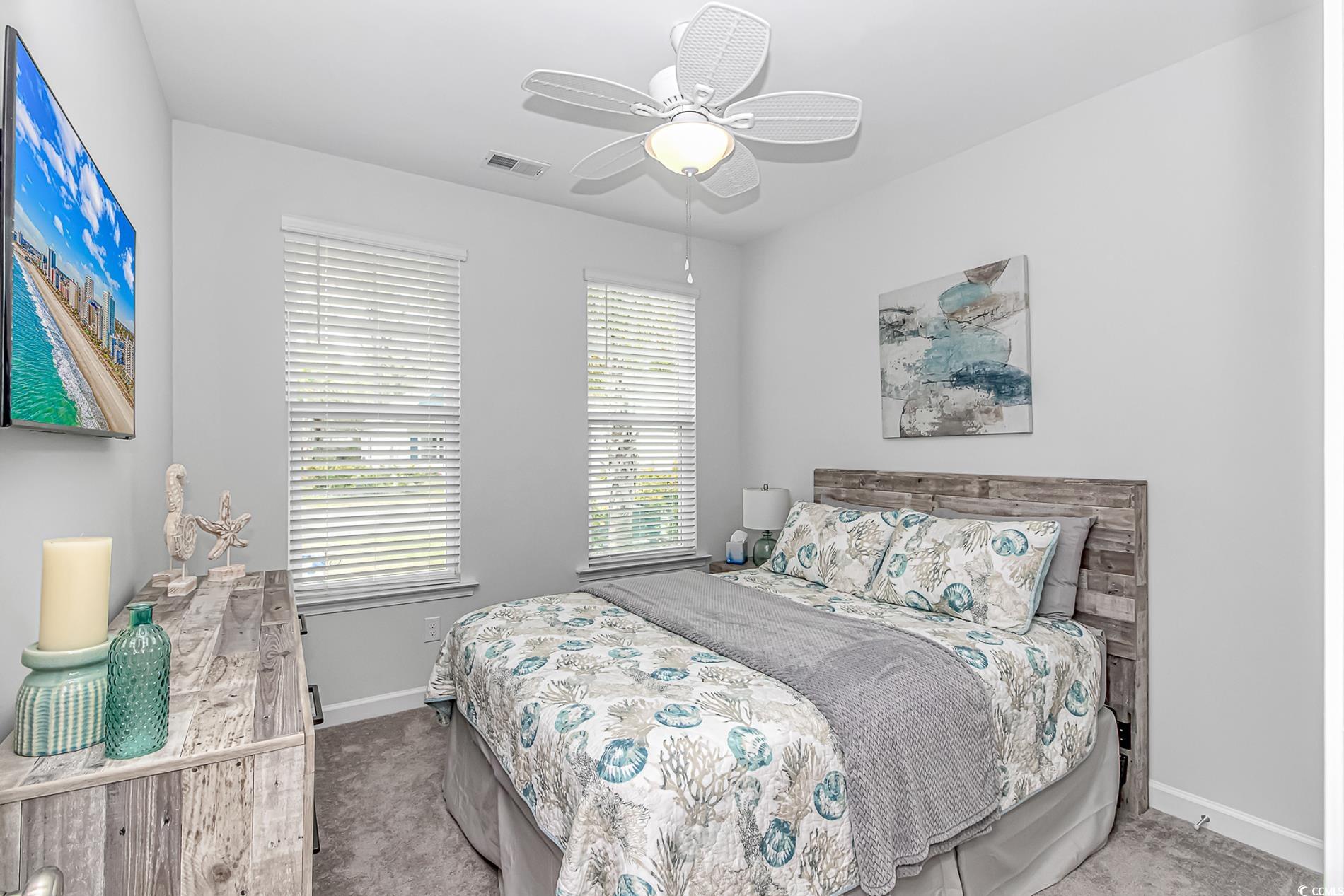222 Sundew Loop Little River, SC 29566 - Photo 23 of 40 Carpeted bedroom with baseboards, visible vents, a