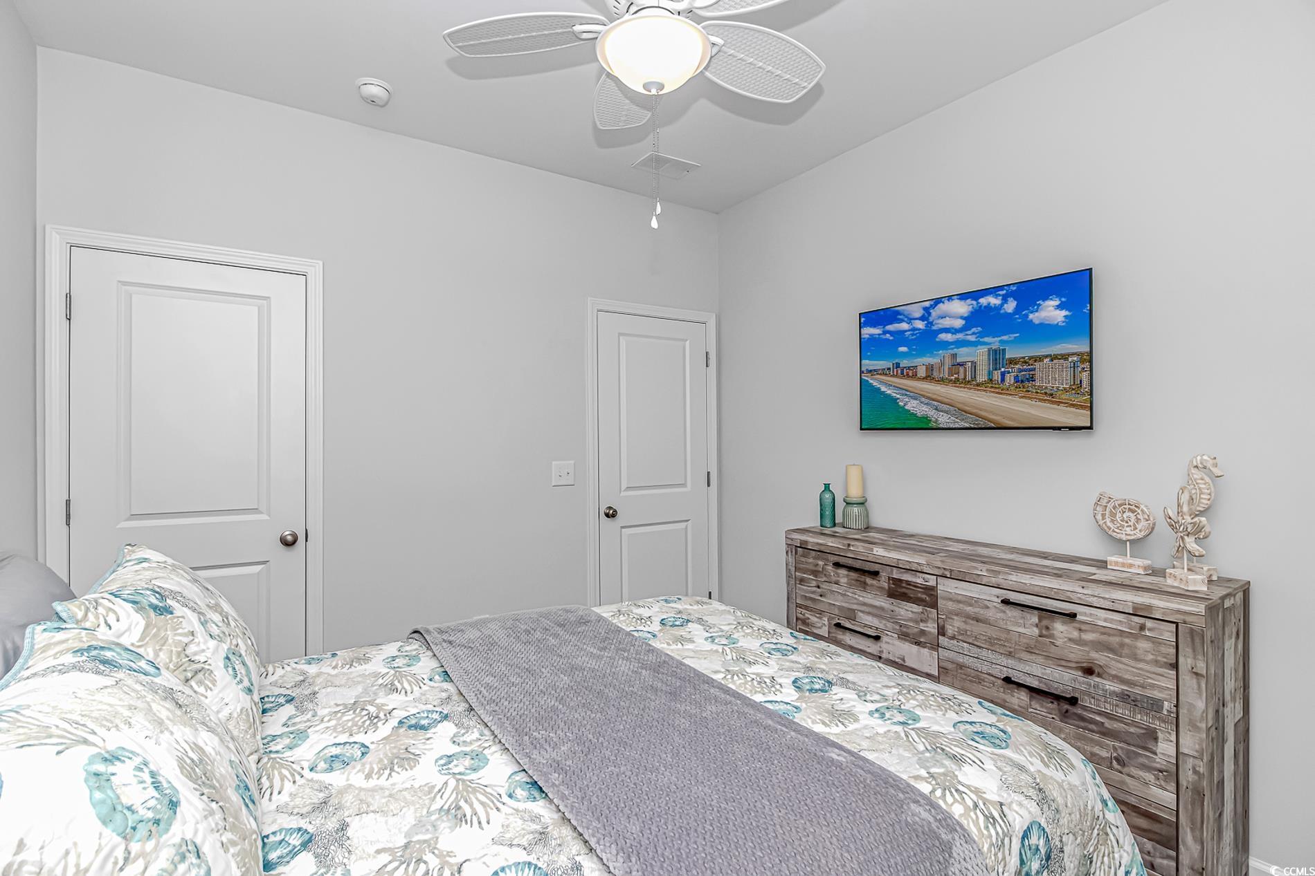 222 Sundew Loop Little River, SC 29566 - Photo 24 of 40 Bedroom with visible vents and a ceiling fan