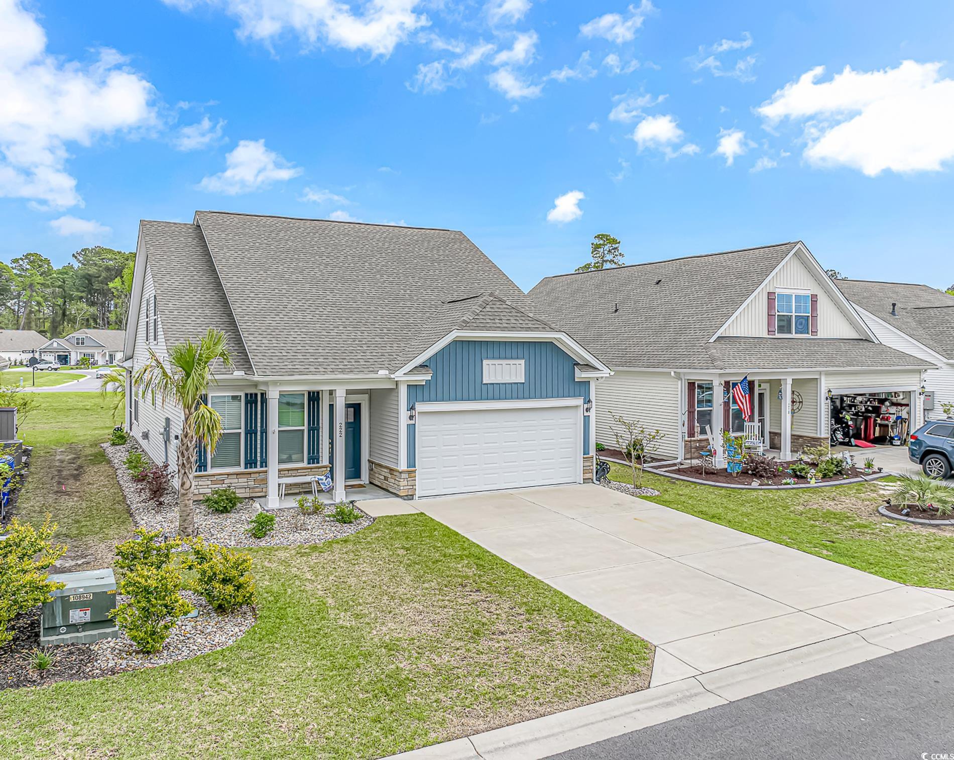 222 Sundew Loop Little River, SC 29566 - Photo 35 of 40 View of front of house featuring stone siding, an