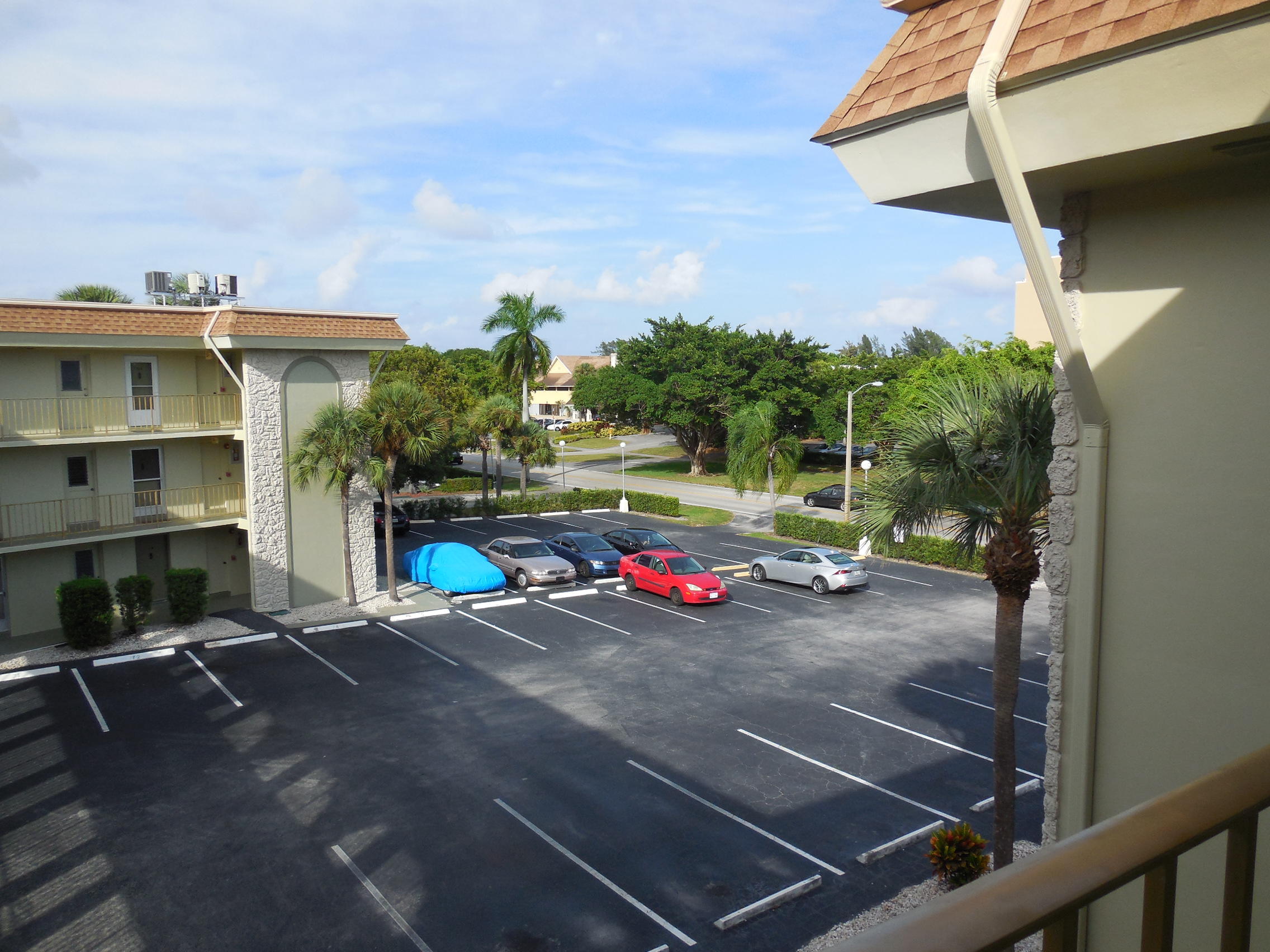 5701 Northwest 2nd Avenue, Unit 3080 Boca Raton, FL 33487 - Photo 5 of 5 a view of a street with sitting area