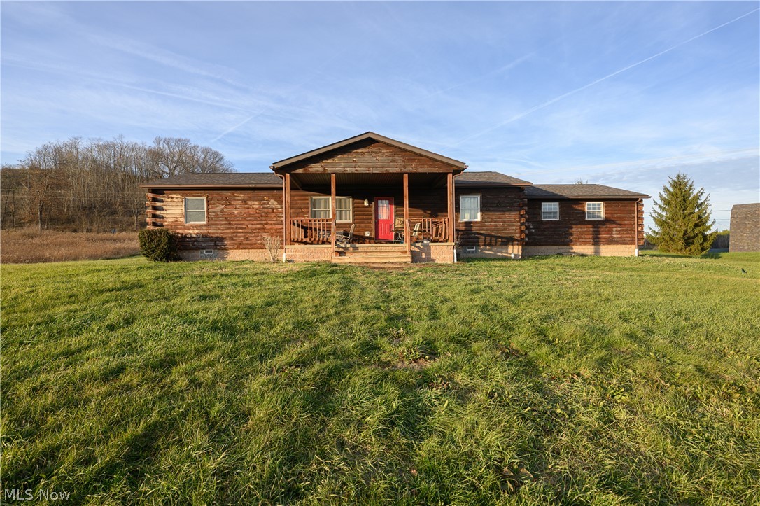 8200 Cutler Road Southwest Sherrodsville, OH 44675 - Photo 2 of 26 View of front of property featuring a front lawn