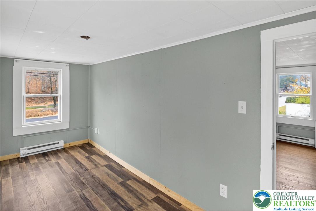 2205 Long Run Road Lehighton, PA 18235 - Photo 16 of 32 a view of an empty room with window and wooden floor