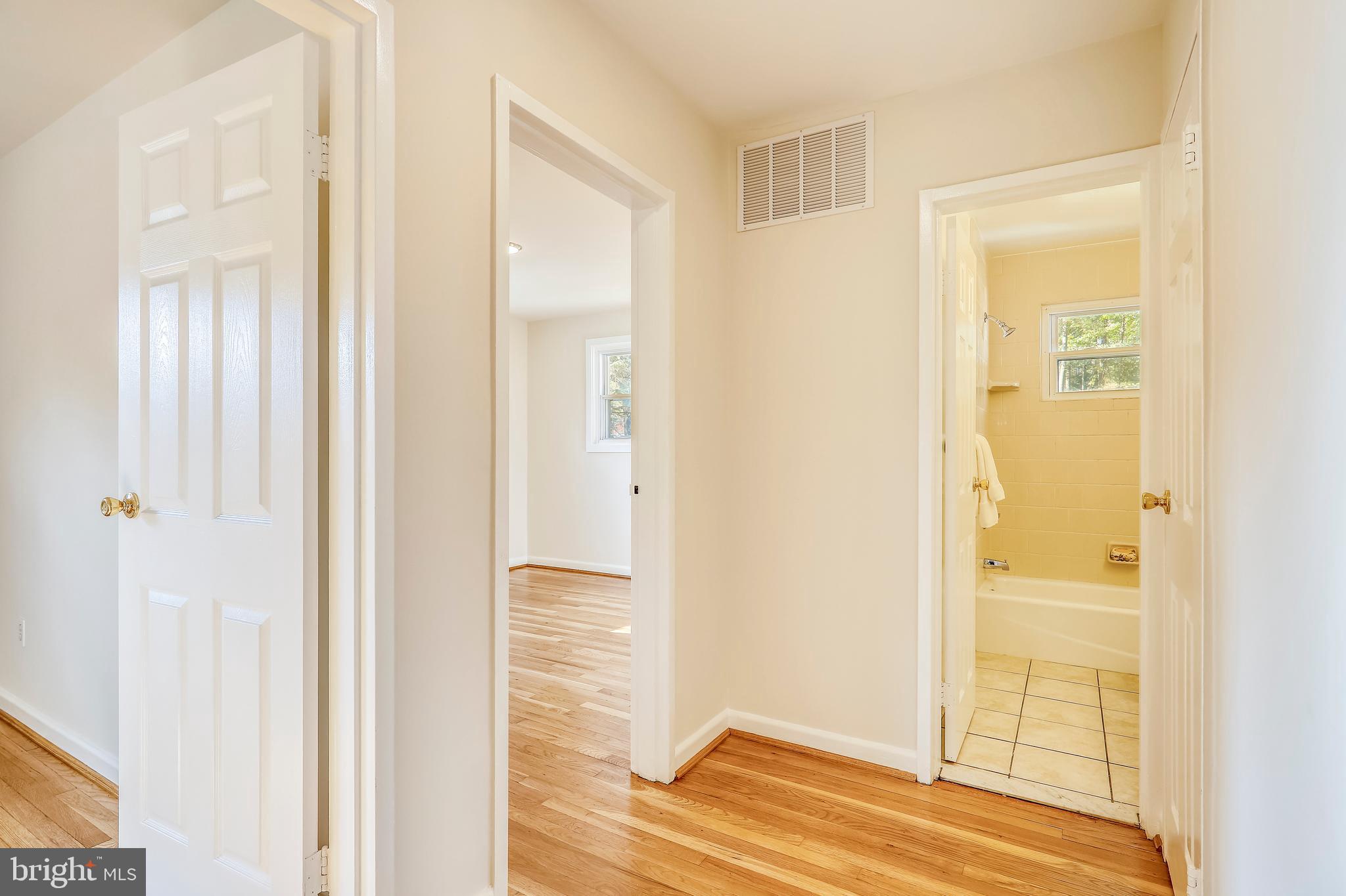 911 Whitehall Street Silver Spring, MD 20901 - Photo 22 of 68 Main level hall w linen closet