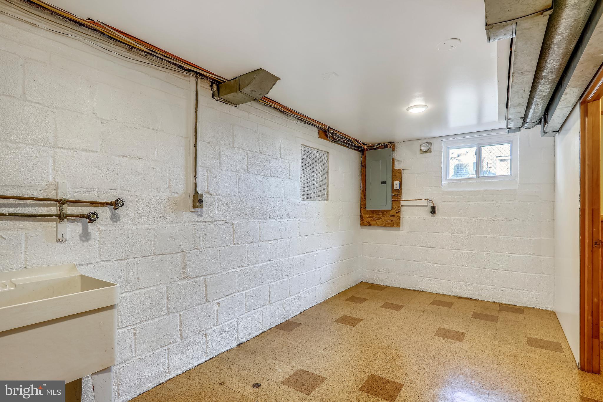 911 Whitehall Street Silver Spring, MD 20901 - Photo 44 of 68 Laundry Room with laundry tub