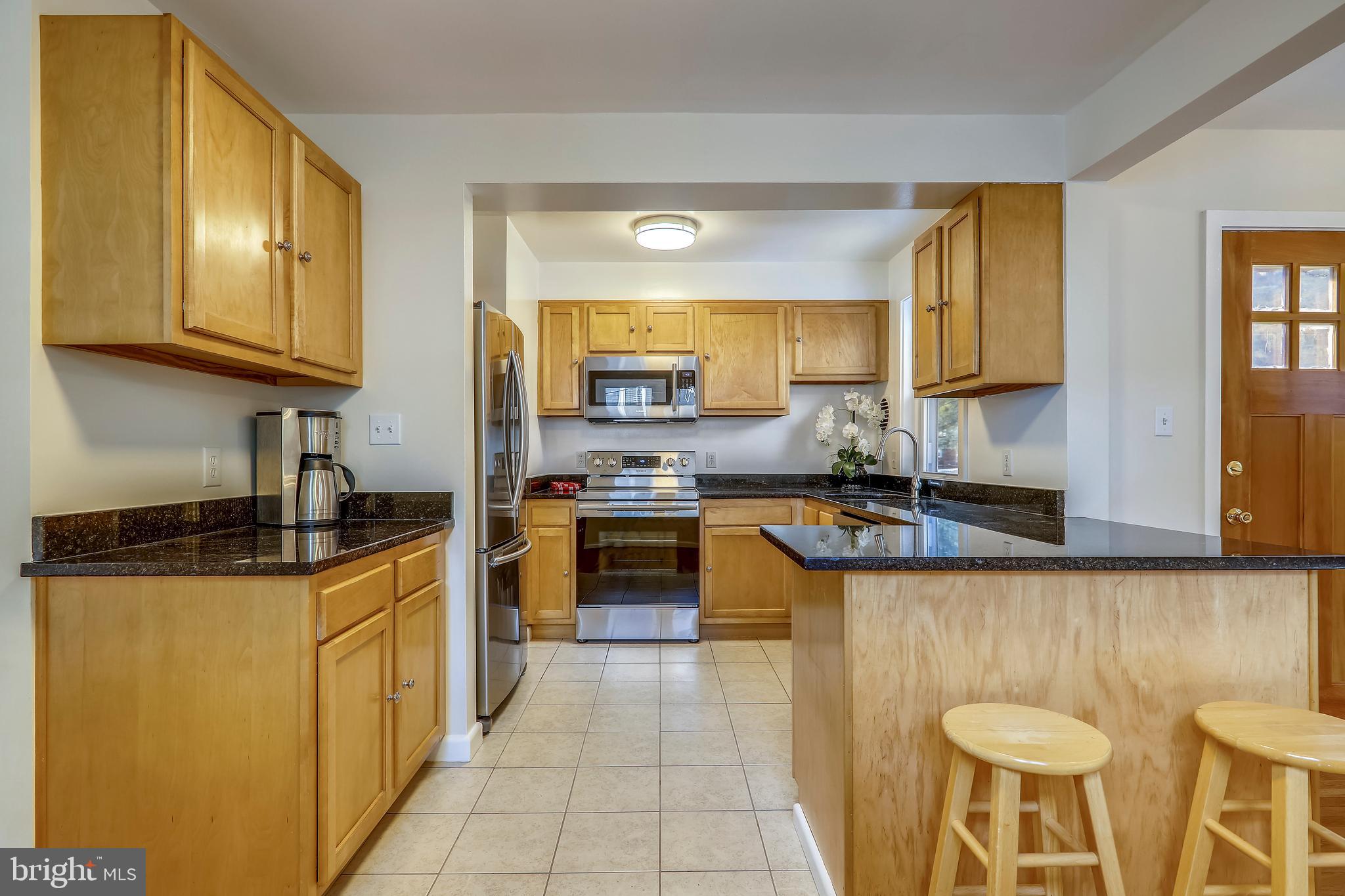 911 Whitehall Street Silver Spring, MD 20901 - Photo 9 of 68 Updated kitchen w granite and new applicances