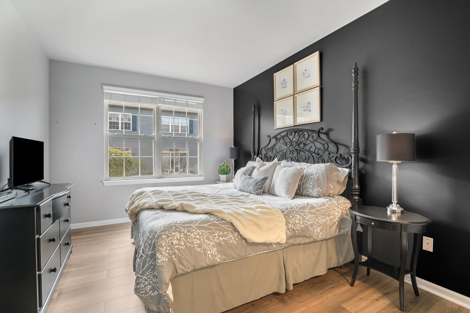 2562 Golf Ridge Circle, Unit 2562 Naperville, IL 60563 - Photo 13 of 22 a bedroom with a bed and wooden floor