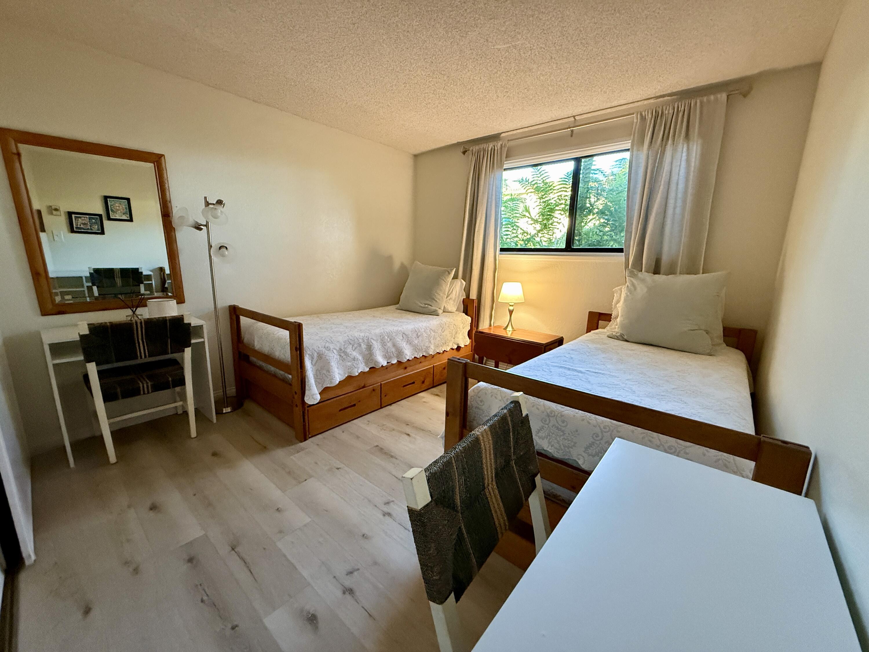 3375 Foothill Road, Unit 511 Carpinteria, CA 93013 - Photo 10 of 13 a bedroom with furniture and a window