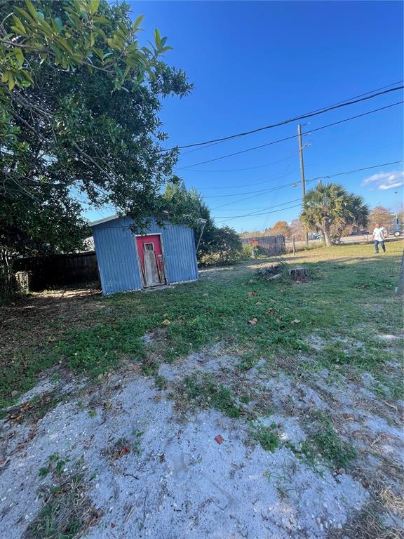632 Cardinal Street Ocoee, FL 34761 - Photo 16 of 29 a view of a backyard