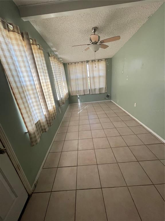 632 Cardinal Street Ocoee, FL 34761 - Photo 23 of 29 a view of an empty room and window