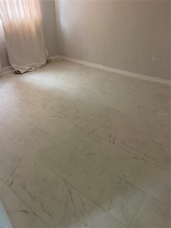 632 Cardinal Street Ocoee, FL 34761 - Photo 29 of 29 a view of an empty room