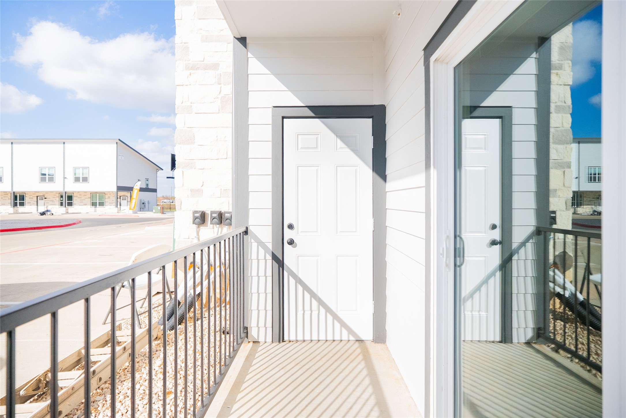2101 Reinke Road, Unit 8206 Waller, TX 77484 - Photo 25 of 33 a view of a balcony and wooden floor