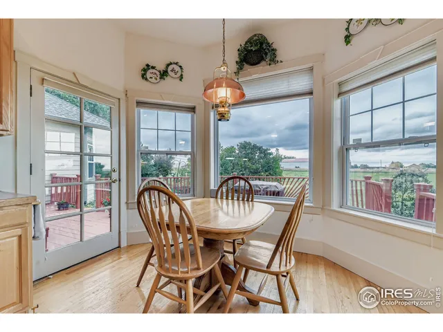 a kitchen with stainless steel appliances kitchen island granite countertop a sink stove and cabinets