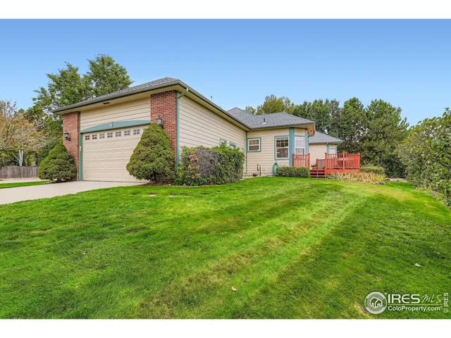 a view of a house with a big yard