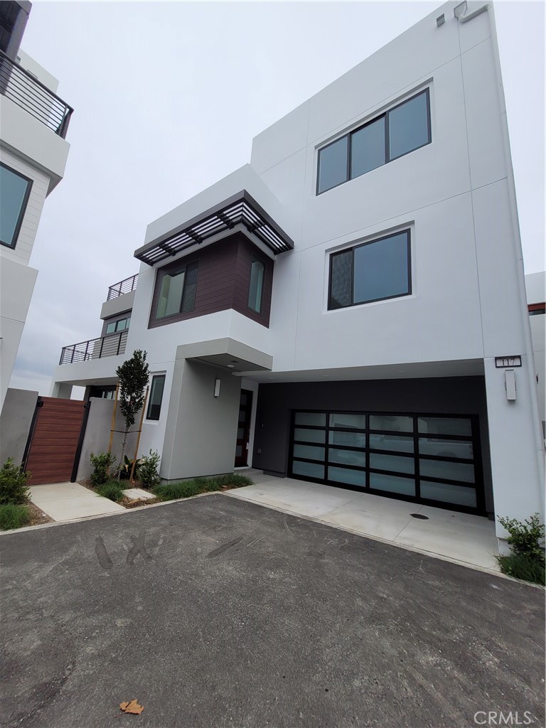 117 Waypoint Tustin, CA 92782 - Photo 1 of 1 a view of a house with a garage
