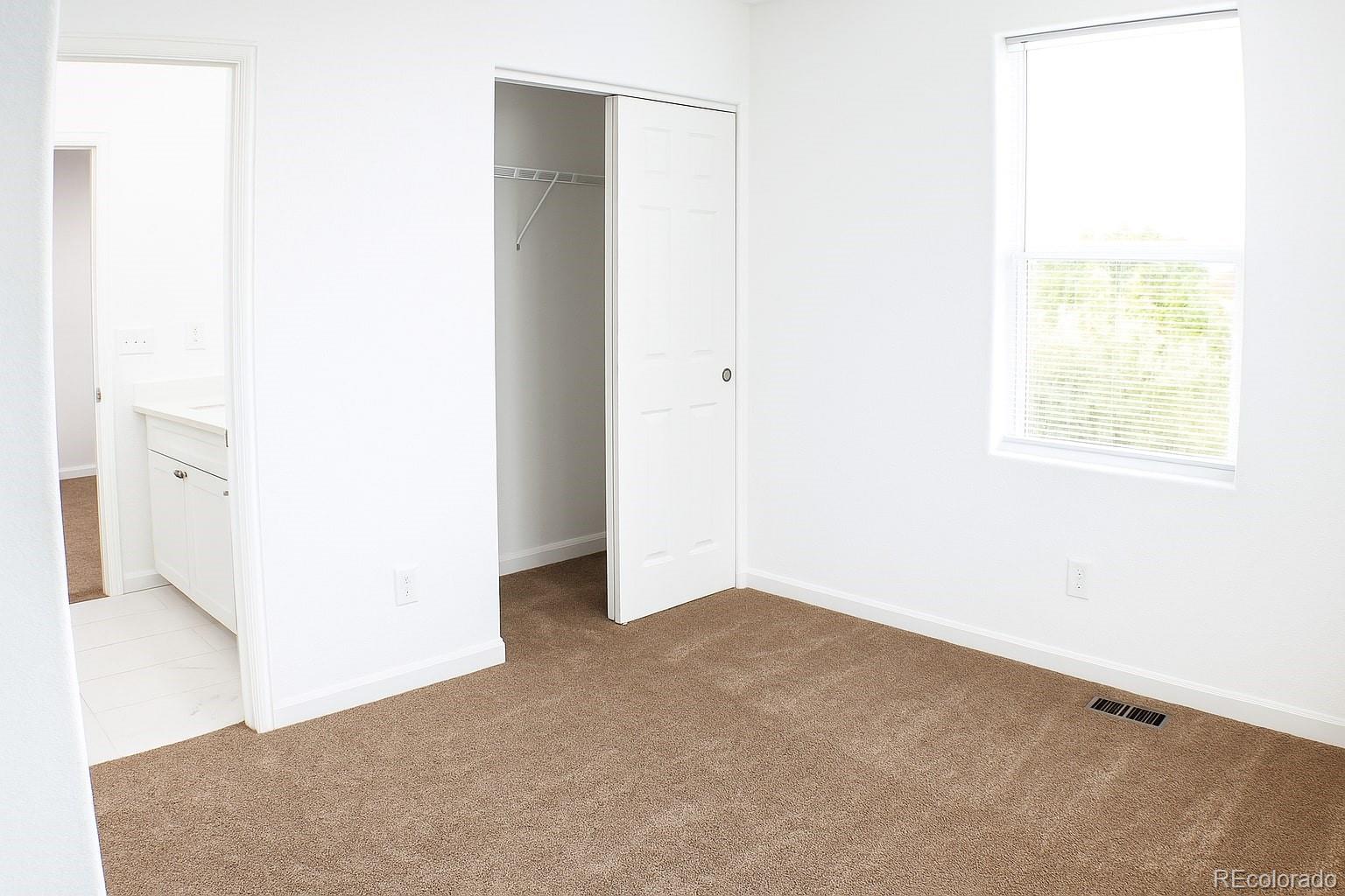 3607 East Uintah Street, Unit 102 Colorado Springs, CO 80909 - Photo 10 of 21 a view of an empty room