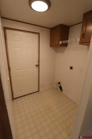 a view of empty room with windows