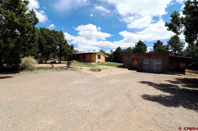 a view of swimming pool with a yard