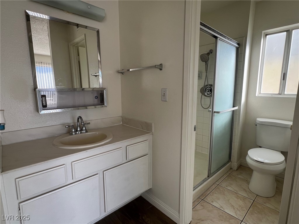 3737 Prosperity Lane Las Vegas, NV 89147 - Photo 19 of 36 Full bathroom with vanity and a stall shower