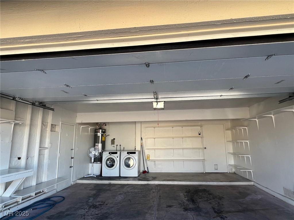 3737 Prosperity Lane Las Vegas, NV 89147 - Photo 34 of 36 Garage featuring washing machine and dryer, strapped water heater, and a garage door opener
