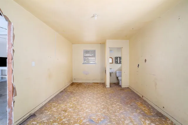 an empty room with a natural light