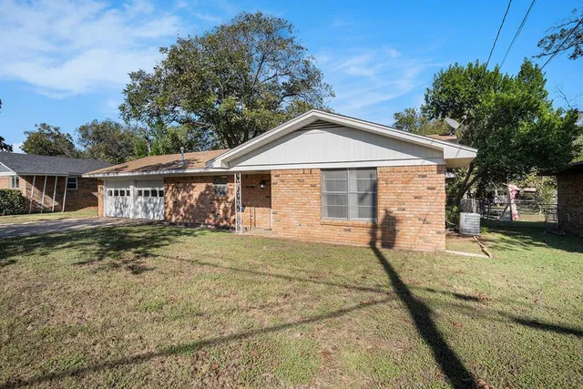 a front view of a house with a porch