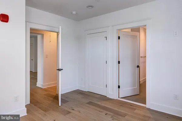a view of entryway with wooden floor