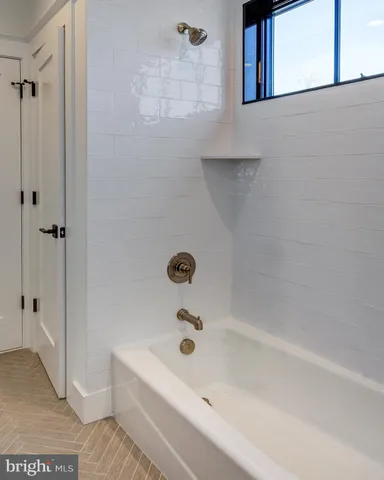 a bathroom with a bathtub