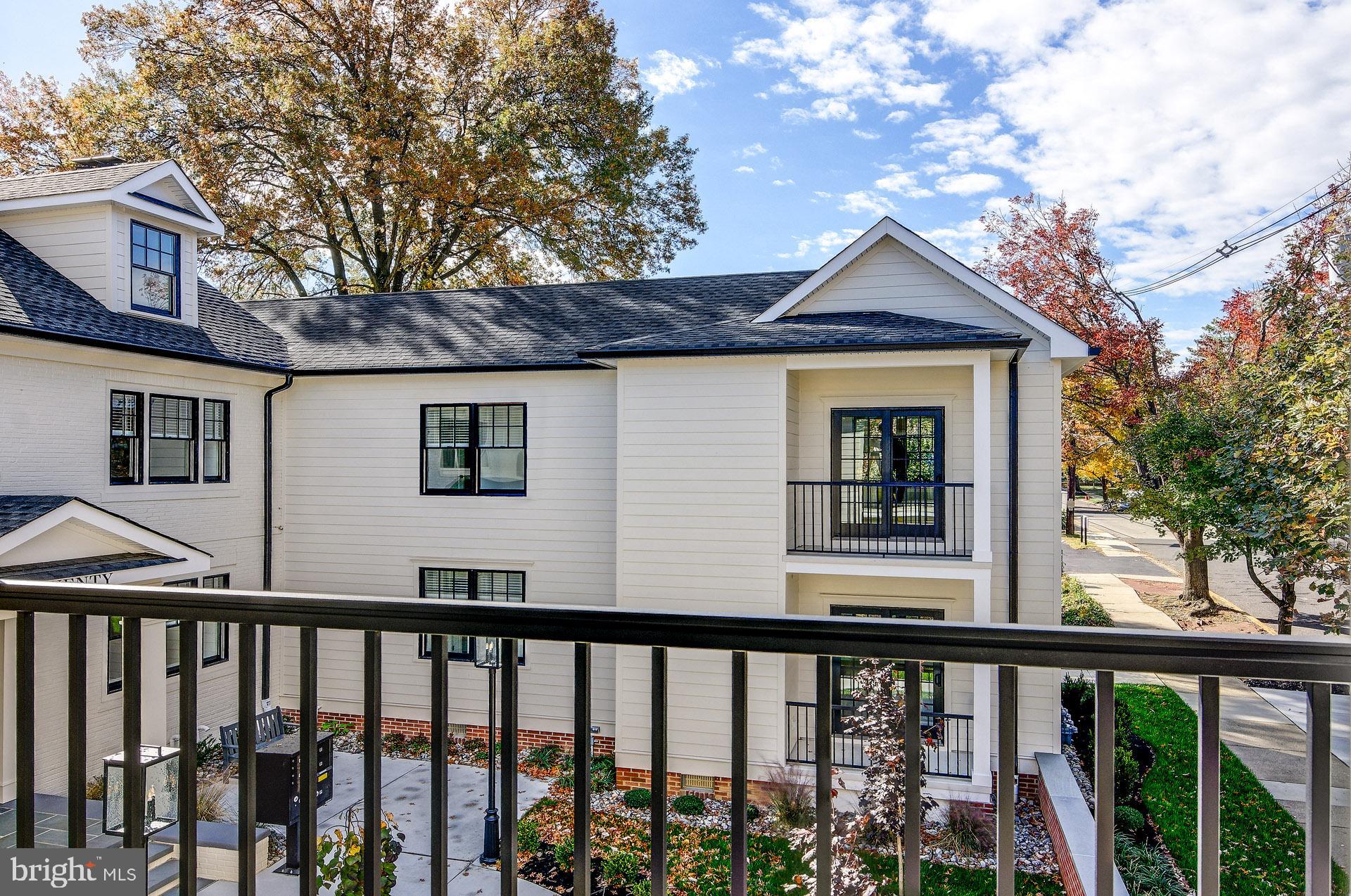 20 East Redman Avenue, Unit C Haddonfield, NJ 08033 - Photo 37 of 43 a view of a brick house with a large window