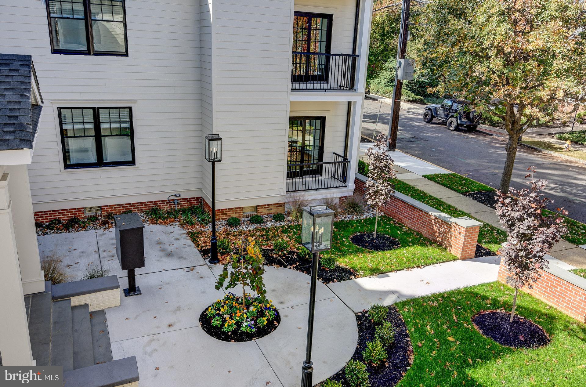 20 East Redman Avenue, Unit C Haddonfield, NJ 08033 - Photo 39 of 43 a front view of a house with garden