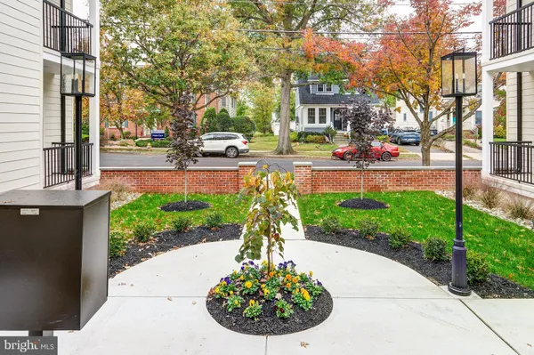 a view of a garden with a fountain