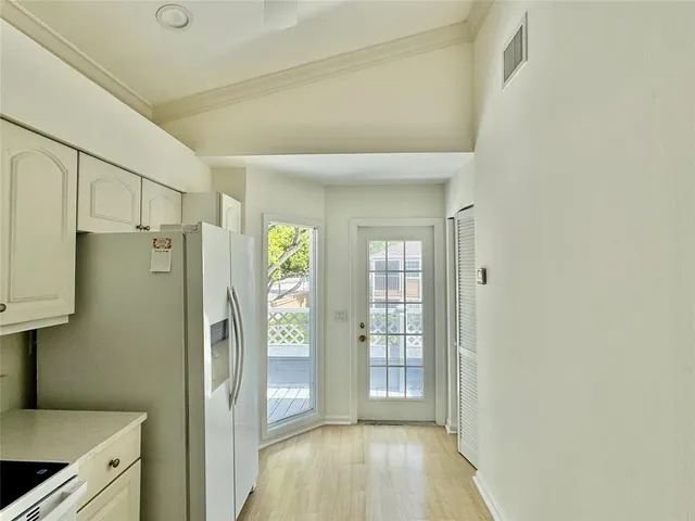 a view of walk in closet with window