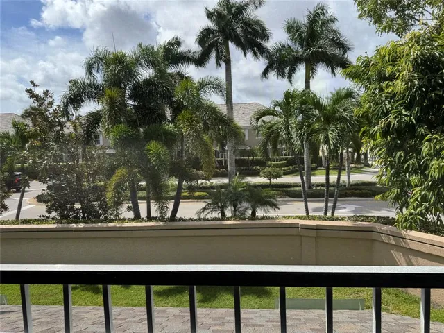 a view of swimming pool from a balcony